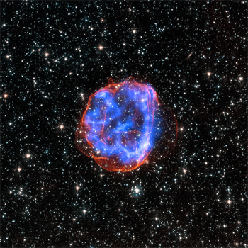 Concha de escombros llamada SNR 0519-69.0 en expansión después de que una estre masiva explotara en la Gran Nube de Magallanes, una galaxia satélite de la Vía Láctea. / NASA/CXC/SAO