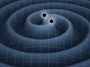Representación artística de un doble agujero negro produciendo ondas gravitacionales. / NASA