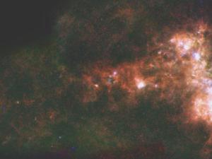 Esta imagen muestra la galaxia Pequeña Nube de Magallanes en luz infrarroja del Observatorio Espacial Herschel, una misión dirigida por la Agencia Espacial Europea y el Telescopio Espacial Spitzer de la NASA.. / ESA/NASA/JPL-Caltech/STScI