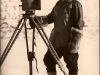 IMAGE IS FOR YOUR ONE-TIME EXCLUSIVE USE ONLY AS A TIE-IN WITH THE NATIONAL GEOGRAPHIC IMAGE COLLECTION. NO SALES, NO TRANSFERS.  Herbert Ponting / National Geographic Society / Steven Kasher Gallery   Self Portrait, Antarctica, 1911-1912. Photographer Herbert Ponting poses by a movie camera and tripod. Ponting, considered the father of polar photography, spent 14 months along AntarcticaÃ¢â¬â¢s Cape Evan with Captain Robert Falcon ScottÃ¢â¬â¢s expedition team. Unpublished photograph from the National Geographic archive.
