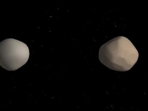 Recreación de cómo puede ser el asteroide binario 2017 YE5. / NASA/JPL-Caltech
